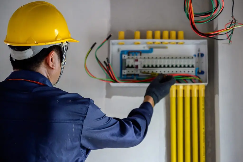 electrician or electrical worker Install and test electrical outlets and switches in houses and structures